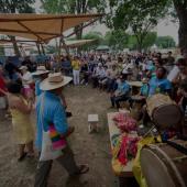 Musicians and audience at cultural celebration in Colombia